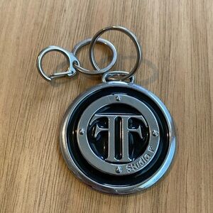 Studio F bag charm in good condition